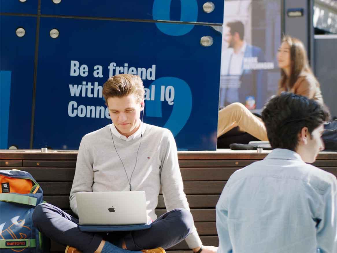 Student sitting on bench