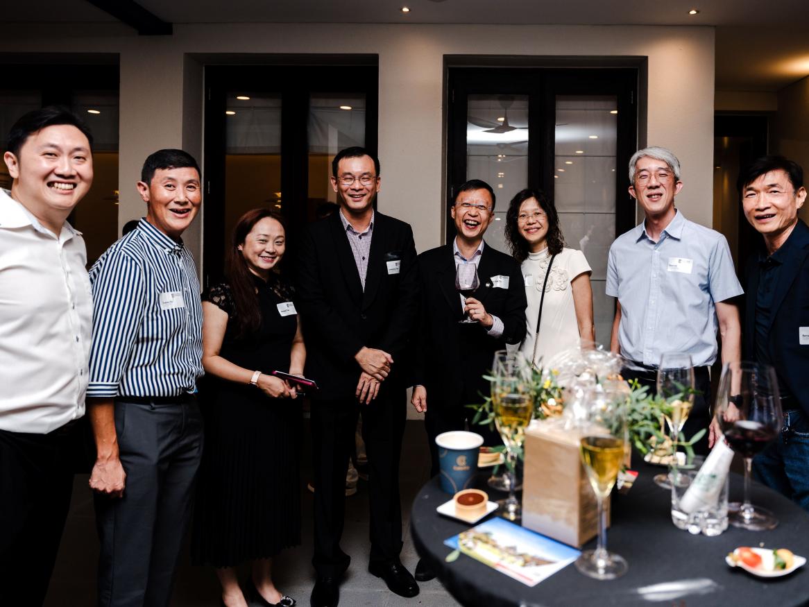 Eight alumni at the celebration in Singapore