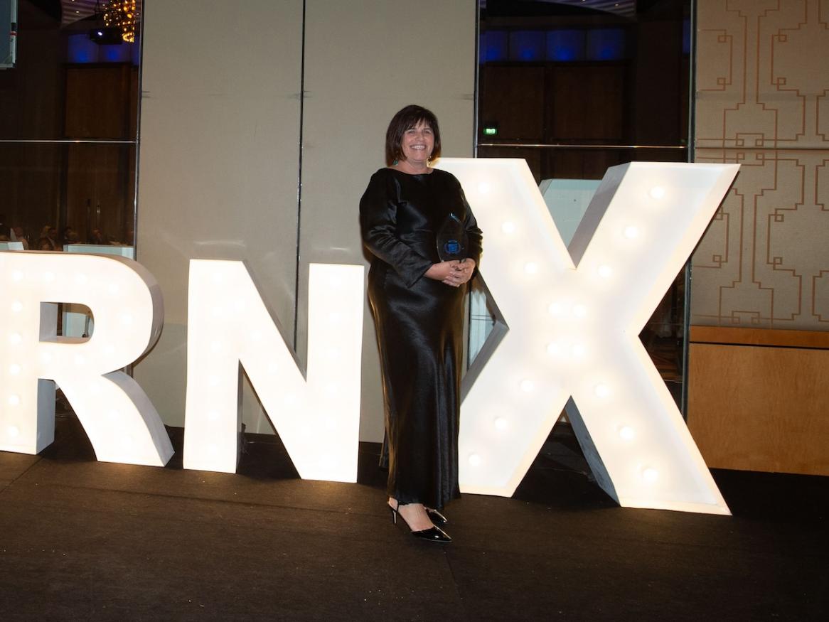 Grega Vrettis, Associate Director of Business Development, receiving the LearnX Award at the Awards Presentation in Melbourne