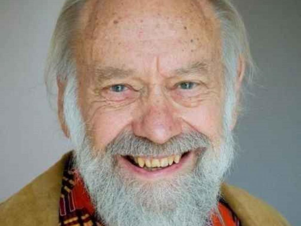 A photo of Michael Alpers smiling